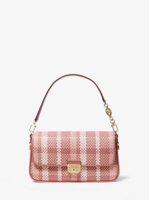 michael kors bradshaw sma size|Bradshaw Small Woven Leather Convertible Shoulder Bag.